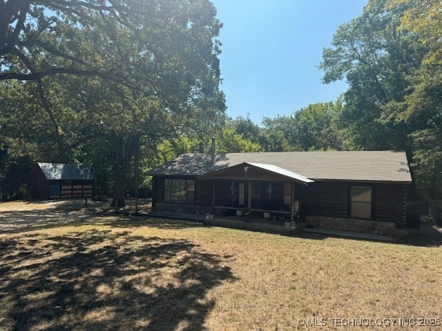 13248 Spelling Rd, Davis, OK 73030 - view of front of property featuring a front yard and an outdoor structure