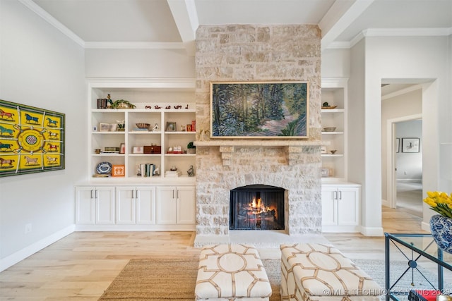 5918 E 127th Pl S, Tulsa, OK 74008 - living room with a stone fireplace, wood finished floors, crown molding, built in shelves, and baseboards