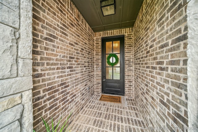 5918 E 127th Pl S, Tulsa, OK 74008 - view of exterior entry featuring brick siding
