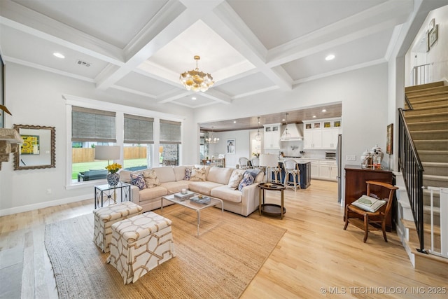 5918 E 127th Pl S, Tulsa, OK 74008 - living area with a chandelier, stairs, light wood finished floors, beamed ceiling, and coffered ceiling
