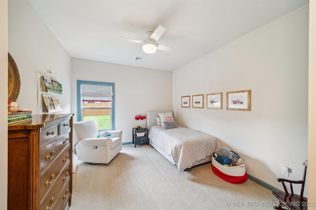 5918 E 127th Pl S, Tulsa, OK 74008 - bedroom featuring light carpet, a ceiling fan, and baseboards