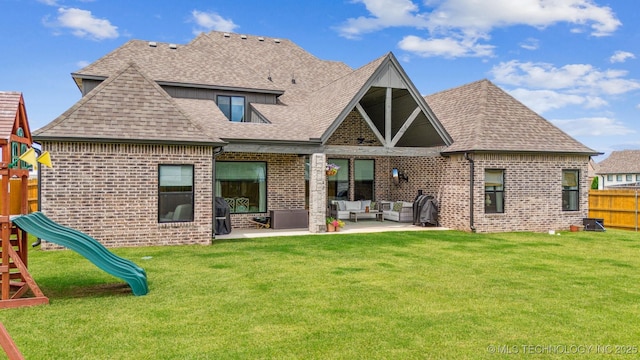 5918 E 127th Pl S, Tulsa, OK 74008 - back of property featuring an outdoor living space, brick siding, and a playground
