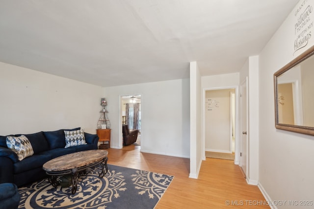3823 S 88th E Pl, Tulsa, OK 74145 - living area featuring light wood finished floors and baseboards
