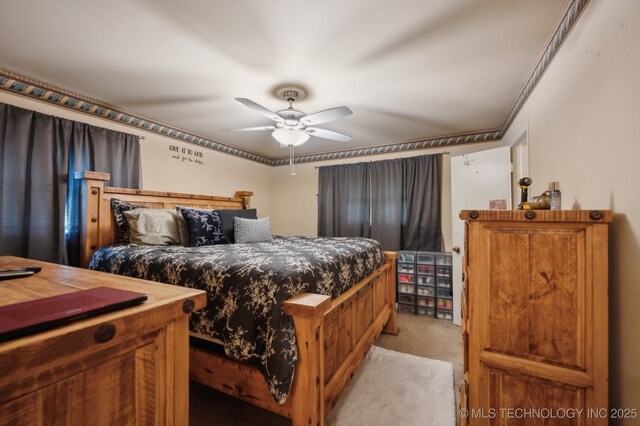 3823 S 88th E Pl, Tulsa, OK 74145 - carpeted bedroom with a ceiling fan