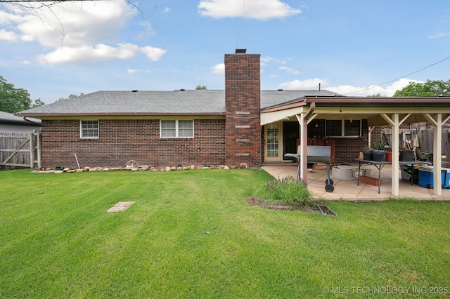3823 S 88th E Pl, Tulsa, OK 74145 - back of property with a patio area, a chimney, brick siding, and roof with shingles