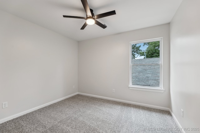 1448 N Main St Unit 2, Tulsa, OK 74106 - carpeted spare room with ceiling fan and baseboards