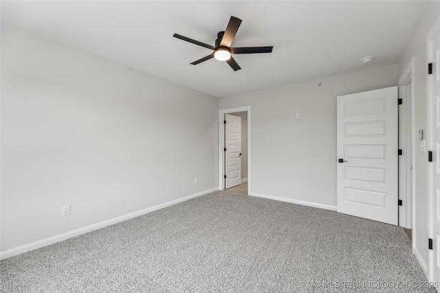 1448 N Main St Unit 2, Tulsa, OK 74106 - unfurnished bedroom with carpet flooring, baseboards, and ceiling fan