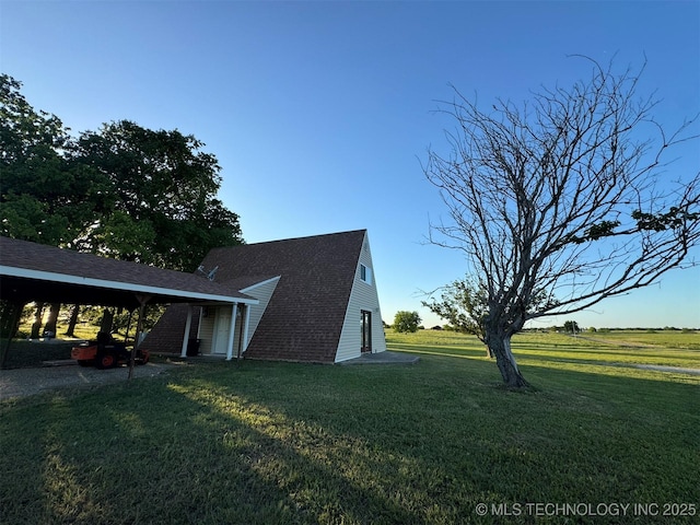 7235 Sunshine Rd, Davis, OK 73030 - view of property exterior with a lawn, a carport, and roof with shingles