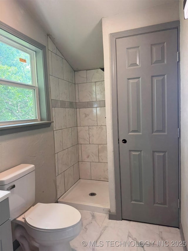 7235 Sunshine Rd, Davis, OK 73030 - full bath featuring a shower stall, marble look tiles, vanity, and toilet