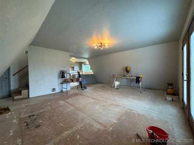 7235 Sunshine Rd, Davis, OK 73030 - unfurnished living room with a textured ceiling