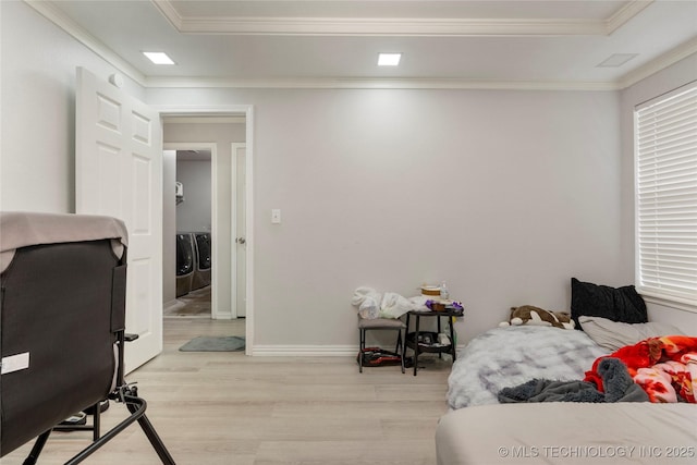 1105 N Joshua Ave, Broken Arrow, OK 74012 - bedroom with washer and clothes dryer, light wood-style floors, crown molding, and baseboards