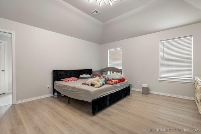 1105 N Joshua Ave, Broken Arrow, OK 74012 - bedroom featuring light wood-style floors, lofted ceiling, and baseboards
