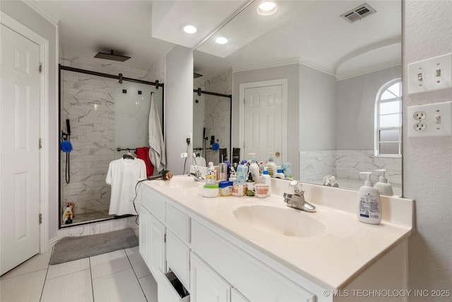 1105 N Joshua Ave, Broken Arrow, OK 74012 - bathroom featuring crown molding, double vanity, a stall shower, tile patterned floors, and recessed lighting