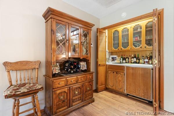 1485 Old Ketchum Rd, Langley, OK 74350 - indoor dry bar with light wood-style flooring
