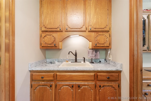1485 Old Ketchum Rd, Langley, OK 74350 - kitchen featuring a sink, light countertops, and brown cabinetry