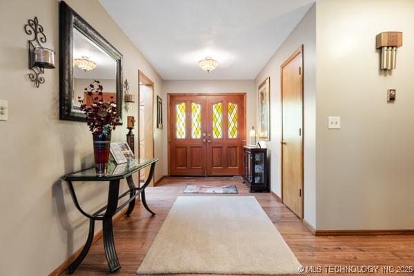 1485 Old Ketchum Rd, Langley, OK 74350 - entrance foyer featuring wood finished floors and baseboards