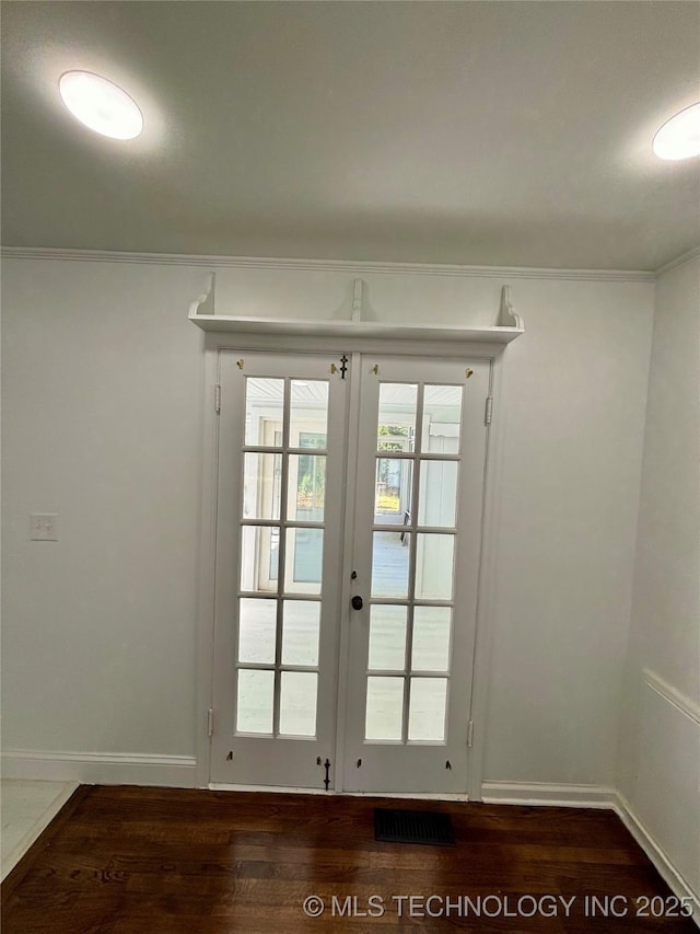 4607 E 4th Pl, Tulsa, OK 74112 - doorway to outside featuring dark wood-style floors, french doors, ornamental molding, and baseboards