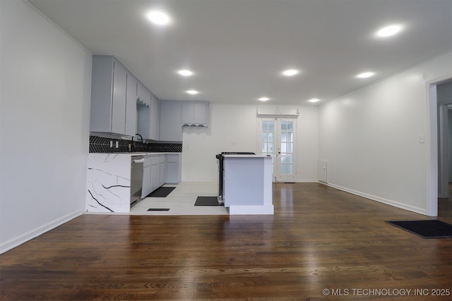4607 E 4th Pl, Tulsa, OK 74112 - kitchen featuring stainless steel dishwasher, french doors, wood finished floors, recessed lighting, and gray cabinets