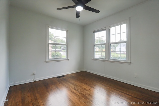 4607 E 4th Pl, Tulsa, OK 74112 - unfurnished room with wood finished floors and ceiling fan