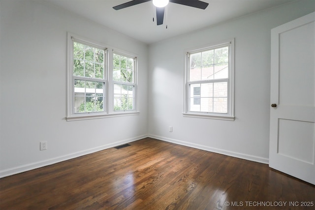 4607 E 4th Pl, Tulsa, OK 74112 - unfurnished room featuring a ceiling fan and dark wood-style floors
