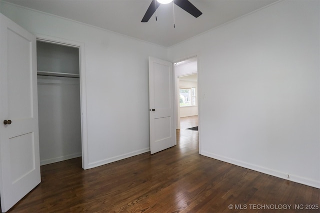 4607 E 4th Pl, Tulsa, OK 74112 - unfurnished bedroom featuring wood finished floors, a closet, and ceiling fan