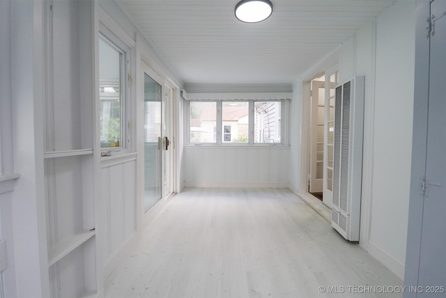 4607 E 4th Pl, Tulsa, OK 74112 - unfurnished sunroom featuring a heating unit