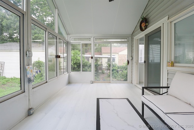 4607 E 4th Pl, Tulsa, OK 74112 - unfurnished sunroom with lofted ceiling