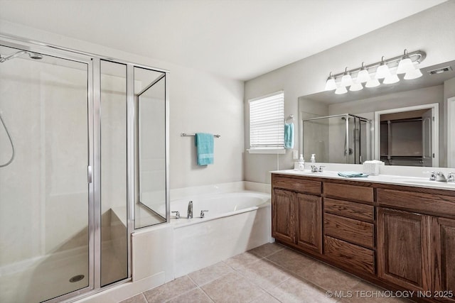 1620 E Granger St, Broken Arrow, OK 74012 - bathroom featuring a stall shower, a bath, double vanity, and tile patterned floors