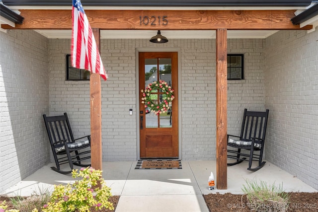10215 E 121st Pl S, Bixby, OK 74008 - entrance to property with brick siding and covered porch