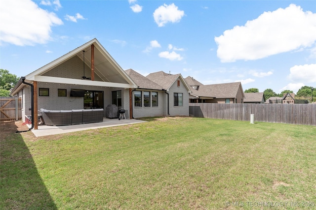 10215 E 121st Pl S, Bixby, OK 74008 - back of house with an outdoor living space, a patio area, brick siding, and ceiling fan