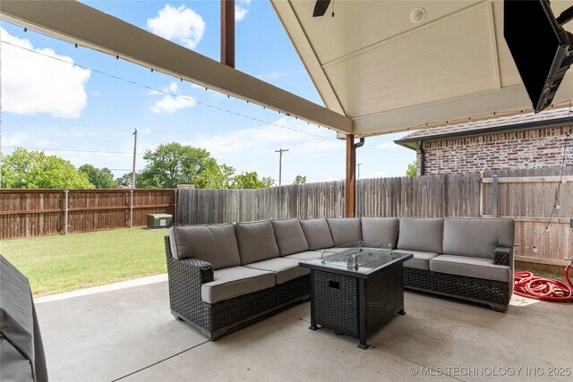 10215 E 121st Pl S, Bixby, OK 74008 - view of patio with an outdoor living space with a fire pit