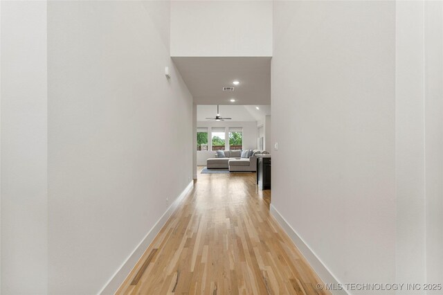 10215 E 121st Pl S, Bixby, OK 74008 - hallway with light wood-type flooring, baseboards, and recessed lighting