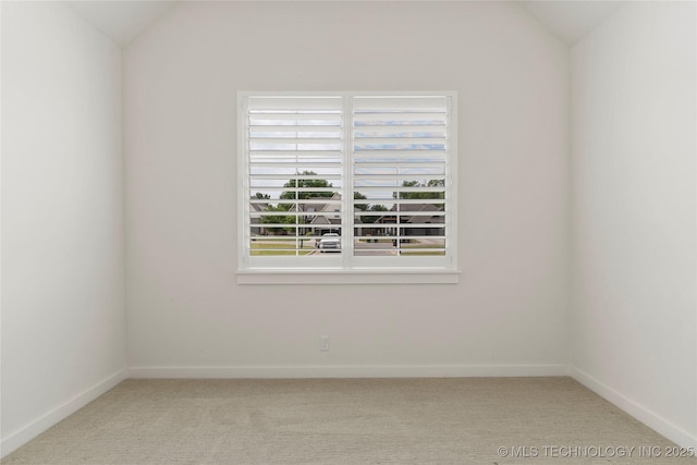 10215 E 121st Pl S, Bixby, OK 74008 - carpeted spare room featuring vaulted ceiling and baseboards