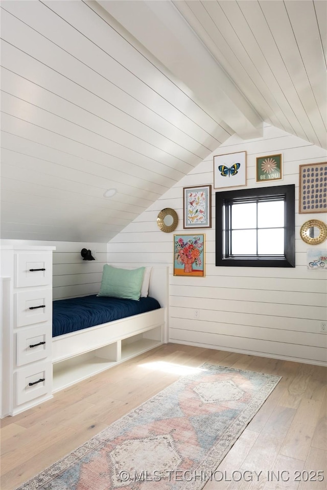 67 Lower Green Way Unit B, Carlton Landing, OK 74432 - bedroom featuring hardwood / wood-style flooring and wooden walls