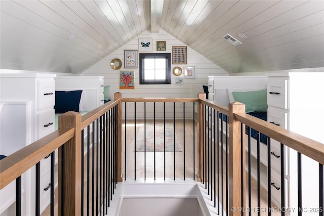 67 Lower Green Way Unit B, Carlton Landing, OK 74432 - corridor with an upstairs landing, vaulted ceiling, wood ceiling, and wooden walls