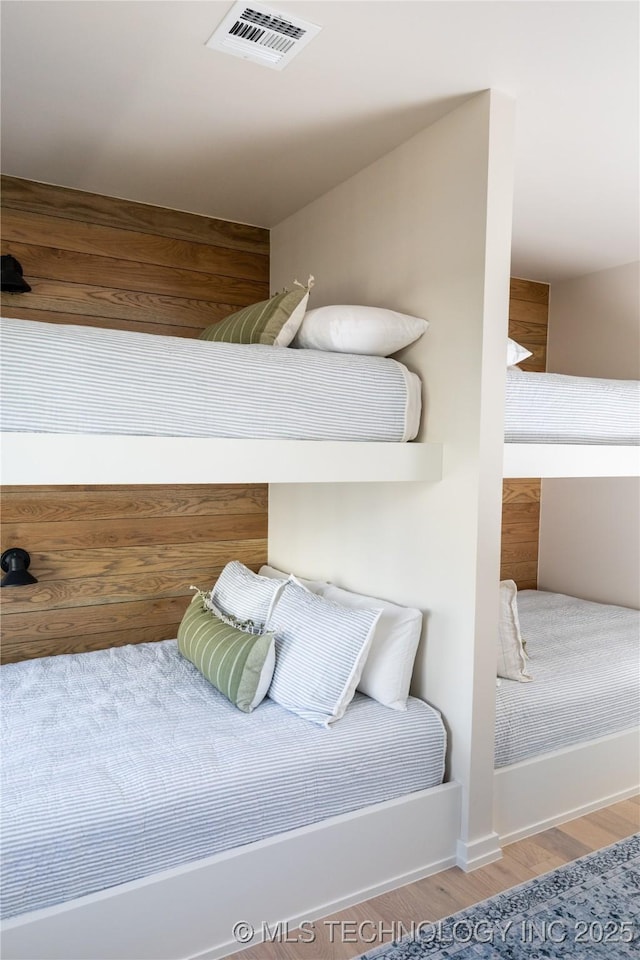 67 Lower Green Way Unit B, Carlton Landing, OK 74432 - bedroom with wood finished floors and baseboards