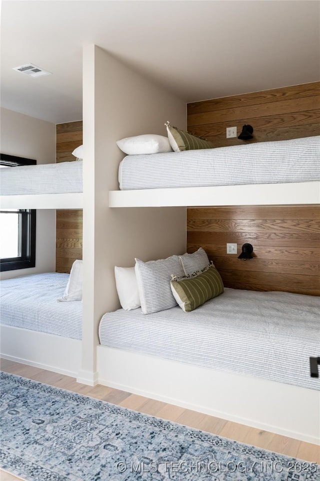 67 Lower Green Way Unit B, Carlton Landing, OK 74432 - bedroom featuring wood finished floors and baseboards