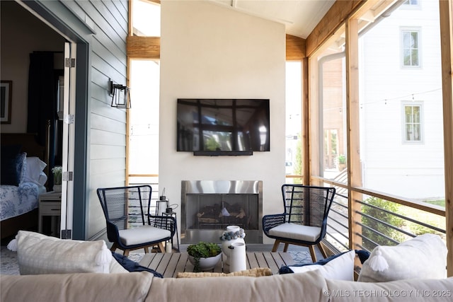 67 Lower Green Way Unit B, Carlton Landing, OK 74432 - living area with a fireplace and vaulted ceiling