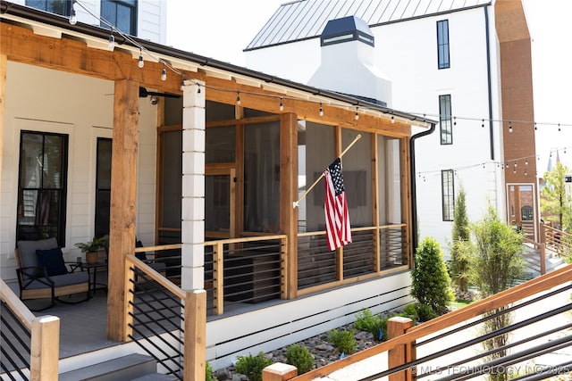 67 Lower Green Way Unit B, Carlton Landing, OK 74432 - wooden deck featuring a sunroom