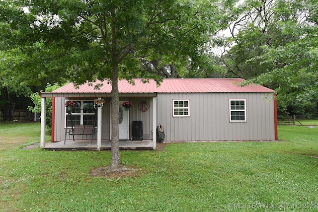 474679 E 1050th Rd, Muldrow, OK 74948 - view of front of property with a front yard, metal roof, and a patio