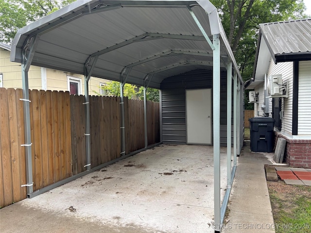 914 3rd Ave NE, Ardmore, OK 73401 - view of vehicle parking with a detached carport