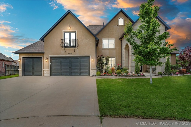 4216 W Orlando St, Broken Arrow, OK 74011 - view of front of house with driveway, stucco siding, french doors, a shingled roof, and an attached garage