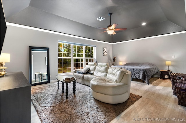 11937 S 18th St, Jenks, OK 74037 - bedroom featuring light wood finished floors, lofted ceiling, a ceiling fan, and baseboards