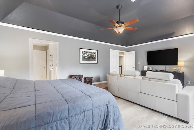 11937 S 18th St, Jenks, OK 74037 - bedroom with light wood-style floors, vaulted ceiling, a ceiling fan, and baseboards