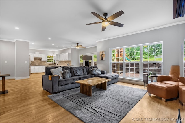 11937 S 18th St, Jenks, OK 74037 - living room featuring a ceiling fan, crown molding, light wood finished floors, recessed lighting, and baseboards