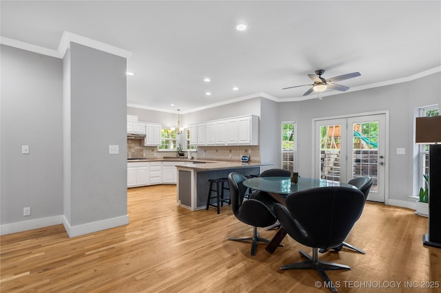 11937 S 18th St, Jenks, OK 74037 - living room featuring recessed lighting, ornamental molding, light wood-style floors, baseboards, and a ceiling fan