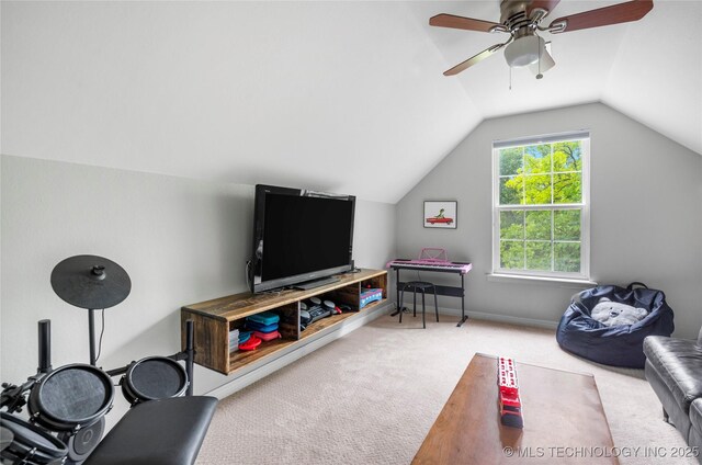 11937 S 18th St, Jenks, OK 74037 - carpeted living room with vaulted ceiling, a ceiling fan, and baseboards
