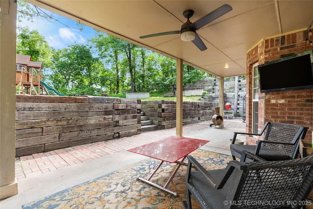 11937 S 18th St, Jenks, OK 74037 - view of patio / terrace with a ceiling fan and a playground