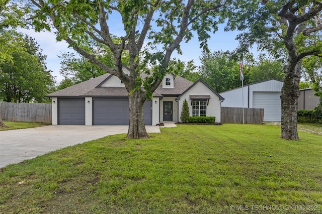 21893 S Arlene Dr, Claremore, OK 74019 - view of front of home with driveway, an attached garage, a shingled roof, and stucco siding