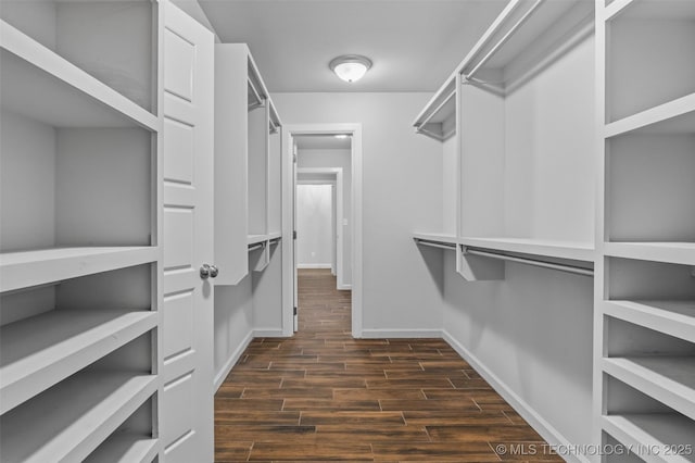 21893 S Arlene Dr, Claremore, OK 74019 - walk in closet featuring dark wood-style flooring